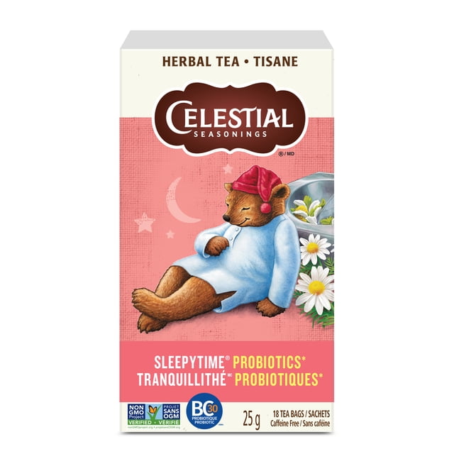 Celestial Seasonings Sleepytime Probiotique herbal tea box with a brown bear in blue pajamas and red nightcap sleeping on a pink background with stars and a crescent moon, chamomile flowers and a glass teapot visible, containing 18 caffeine-free tea bags, 25 grams, Non-GMO Project Verified and probiotic certified for a soothing bedtime routine.