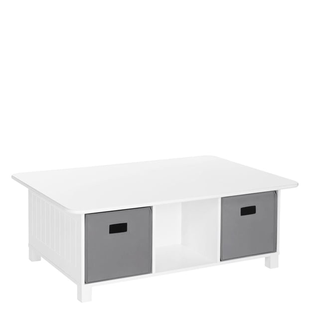 RiverRidge® Home 6-Cubby Storage Activity Table in white with two grey fabric bins, featuring a rectangular tabletop and six cubbies for toddler playroom storage, designed low to the ground for easy child access.