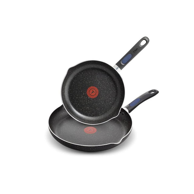 Signature 2pc Frypan Set (24/30cm) with two black stone-effect non-stick pans featuring red Thermo-Spot heat indicators, riveted Bakelite handles with blue silicone grips, and pour spouts. Compatible with all cooktops except induction and oven-safe up to 175°C, also suitable for preparing sauces and sautéing vegetables.