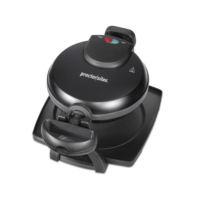 Proctor Silex Flip Belgian Waffle Maker in black with nonstick plates and a cool-touch handle for safe flipping, featuring power and ready indicator lights on top and a black drip tray underneath, ideal for making thick, fluffy waffles evenly browned.