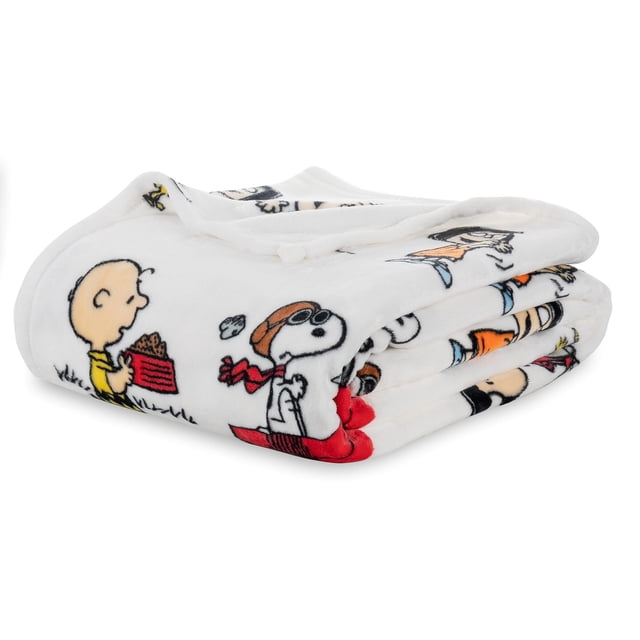 Cute Cartoon Snoopy Flannel Blanket made from anti-pilling flannel, featuring a playful design of Snoopy and Peanuts characters. The blanket is lightweight, durable, and folds compactly, perfect for use on a sofa, bed, or during travel. Its hypoallergenic, wrinkle-proof, and non-shedding properties make it ideal for those with allergies or asthma. The image shows the blanket folded, emphasizing its soft texture and vibrant cartoon illustrations.