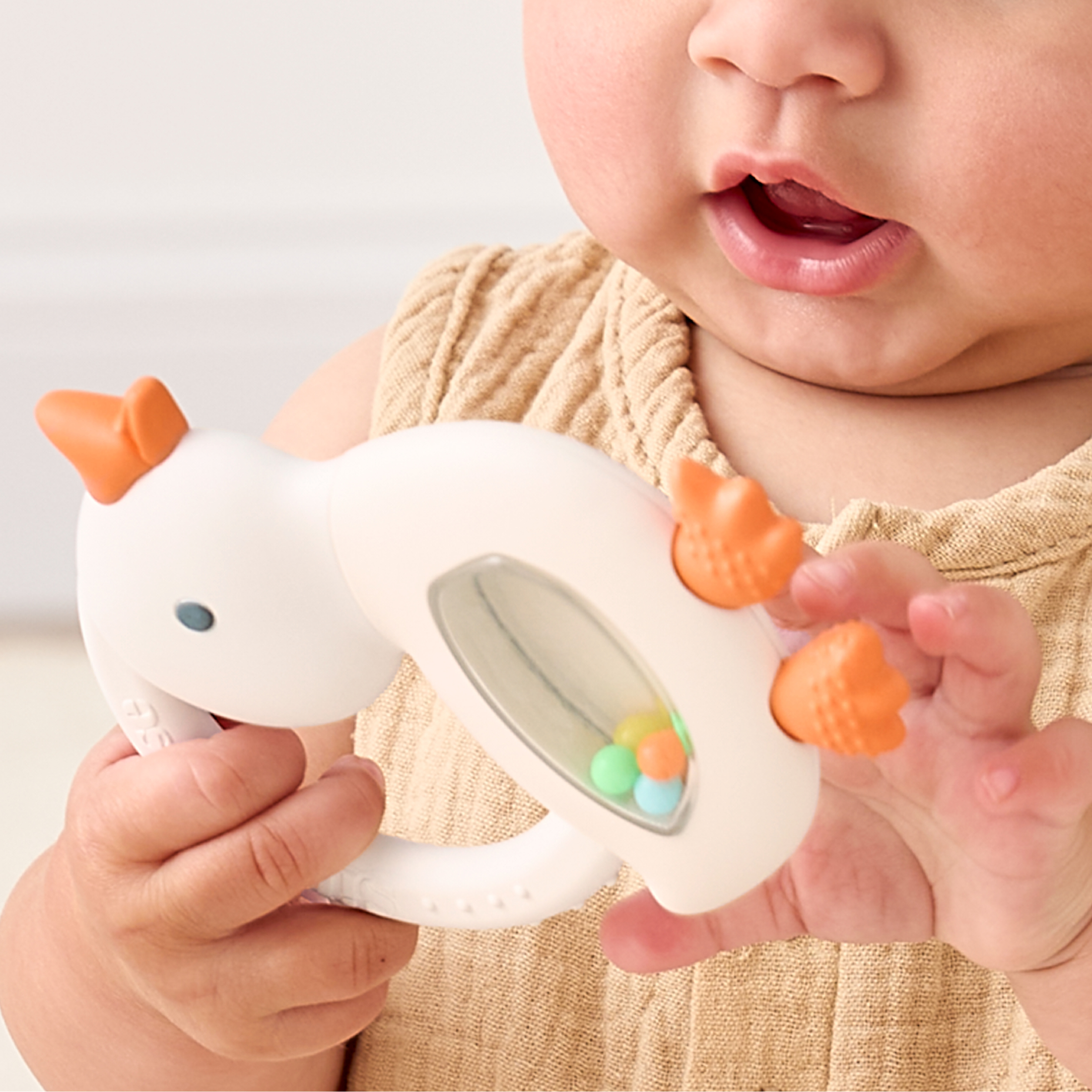 Itzy Ritzy Bitzy Shake™ Goose Silicone Teether and Rattle for Infants, 3+ Months