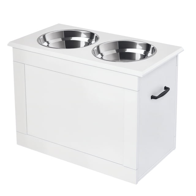 PawHut Elevated Dog Bowls with Storage in white, designed for large dogs. The feeder features a sturdy P2 grade MDF construction with two removable stainless steel bowls, each with a 2L capacity. The elevated design reduces strain on dogs' necks, backs, and joints. Includes hidden storage space for pet supplies and side handles for easy mobility. Dimensions: 23.6 inches long, 11.8 inches wide, and 16.1 inches high.