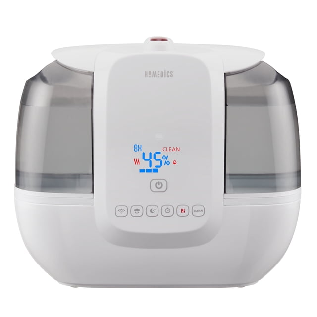HoMedics TotalComfort Ultrasonic Humidifier with UV-C Technology featuring a white design with a digital display showing humidity level and timer settings. Includes a 2-gallon top-fill water tank with built-in carry handles, visible ultrasonic warm and cool mist options, and a programmable digital humidistat. Offers up to 120 hours of runtime, 5 mist output settings, and covers up to 587 sq. ft. Additional features include UV-C technology, night-light with on/off function, and auto-off timer settings.
