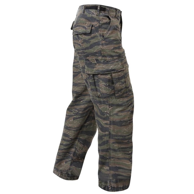 Rothco Vintage Vietnam Fatigue Pant Rip-Stop in Tiger Stripe Camo, Medium size. Made from durable 100% cotton rip-stop material, featuring six pockets including slant pockets, and a zipper fly. Ideal for gender-neutral bottoms with a vintage surplus aesthetic.