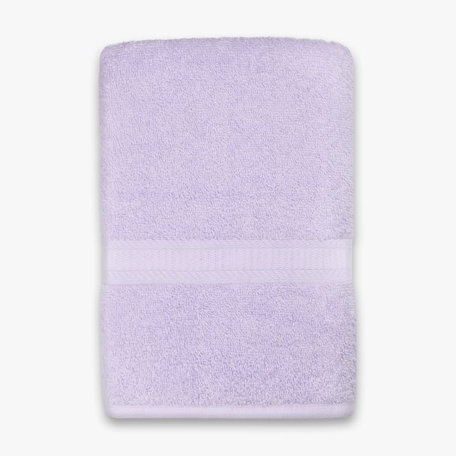 Mainstays Basics Solid Bath Sheet in light purple, folded with a textured band, made of 100% cotton terry cloth measuring 30 by 60 inches, designed for softness and absorbency in bathroom accessories and daily bath towel use.
