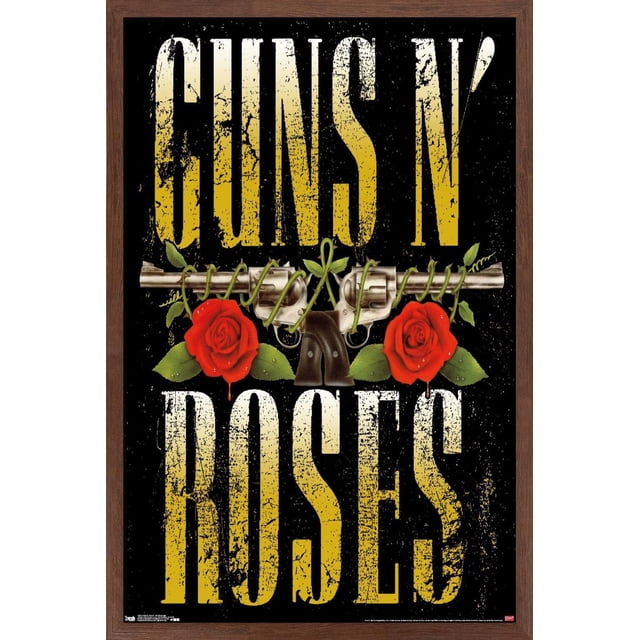 Guns N' Roses - Stacked Logo Wall Poster, 22.375" x 34" featuring distressed yellow and white text on black with two silver revolvers crossed horizontally, entwined with green vines and flanked by red roses with green leaves. The glossy poster is framed in dark wood, suitable for wall art and home décor.