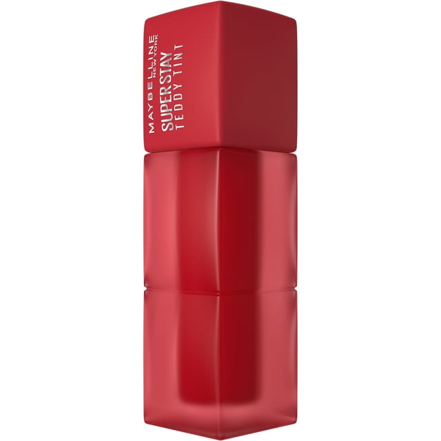 Maybelline New York Super Stay Teddy Tint, Soft Lip Tint, SuperStay Soft Matte Lipstick centered tube with wand and a single blurred swatch in warm teddy-brown on white; shows matte, buildable blurred finish, long-wear no-transfer 12-hour wear, vegan formula, often used as a subtle cheek tint.