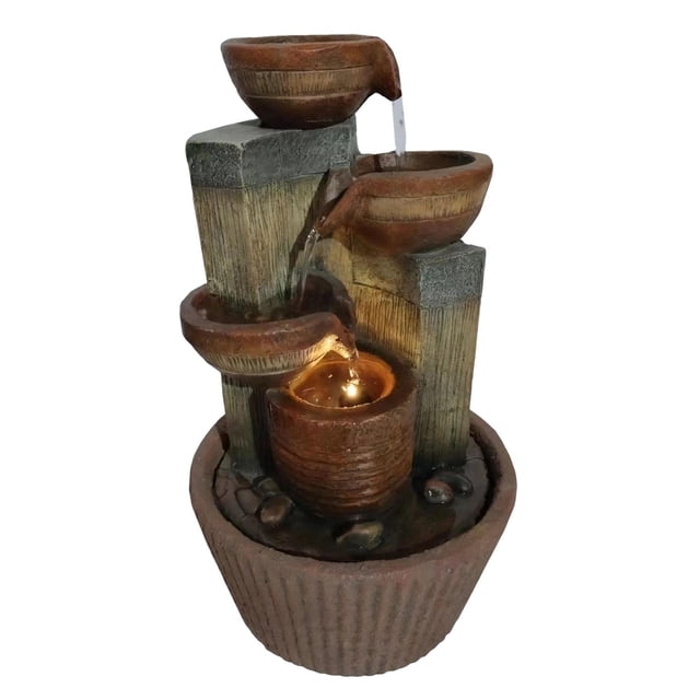 Angelo Décor 17-Inch Tazze Patio Deck Fountain with energy-efficient pump and LED lighting, featuring three brown tazze bowls cascading water into a central textured pot on a ribbed round base with decorative stones, suitable for enhancing outdoor patios or gardens.