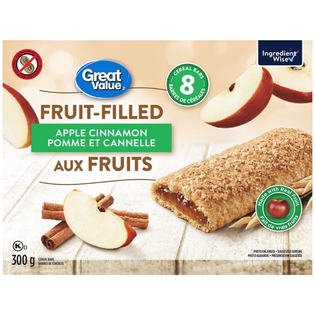 Great Value Apple Cinnamon Cereal Bars box showing a fruit-filled cereal bar with visible apple cinnamon filling on a wooden surface with apple slices and cinnamon sticks, containing 8 bars per 300 g box made with real fruit and free from artificial flavors and colors, ideal for a quick snack or lunchbox treat.