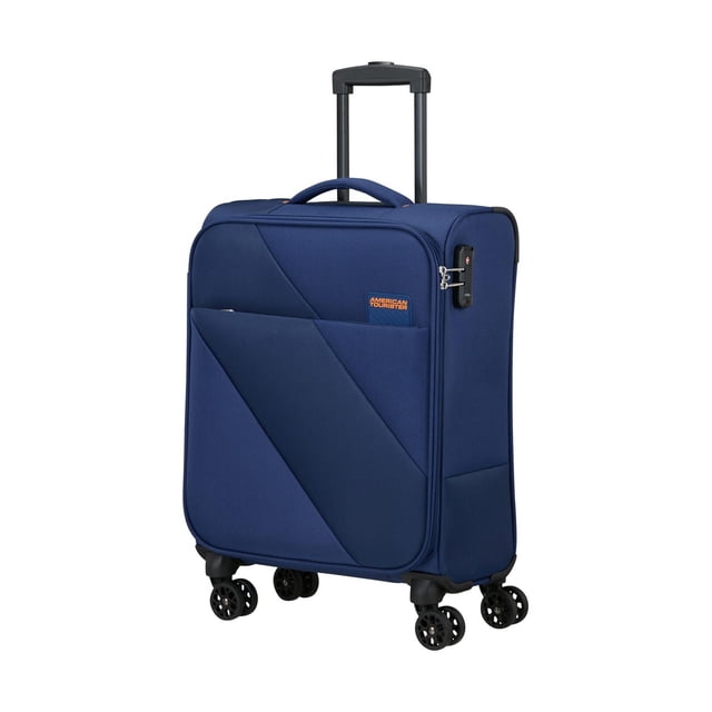 American Tourister Sun Break Spinner Carry On in navy blue fabric with geometric front pocket design, TSA-approved combination lock, dual spinner wheels, lightweight build, and multi-stage pull handle extended for easy navigation, ideal for carry-on travel.
