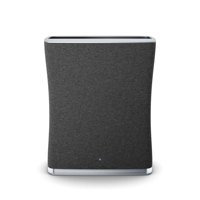 ROGER Air Purifier with a grey washable textile pre-filter covering the front, featuring a rectangular curved shape with white top and base edges, and a blue LED air quality indicator near the bottom center, designed for continuous air monitoring and purification in rooms up to 700 sq ft.