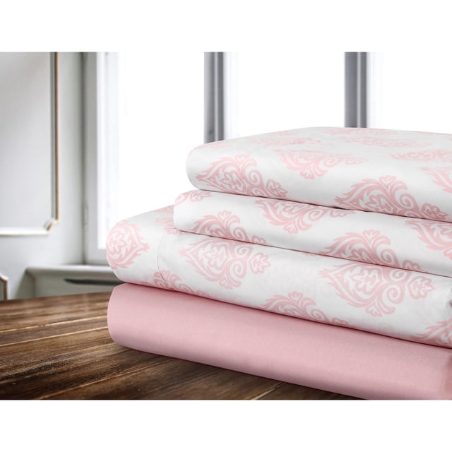 Safdie & Co. Sheet Set Microfiber 4PC K Damask Printed Solid Pink featuring four folded sheets on a wooden surface, including two white sheets with pink damask print and two solid pink microfiber sheets, hypoallergenic and dust mite resistant, displayed near a window.