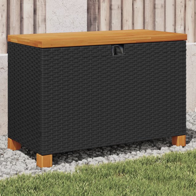 vidaXL Garden Storage Box Black 80x40x48 cm made of poly rattan and acacia wood. The box features a black woven poly rattan exterior with a sturdy acacia wood top in a natural brown finish. It includes a removable, water-resistant inner bag for storing cushions, toys, and other items. The box is designed with a gas spring for safe and easy lid operation and can also function as a bench seat. Dimensions are 80x40x48 cm, with a maximum load capacity of 160 kg. Suitable for outdoor use in gardens or patios.