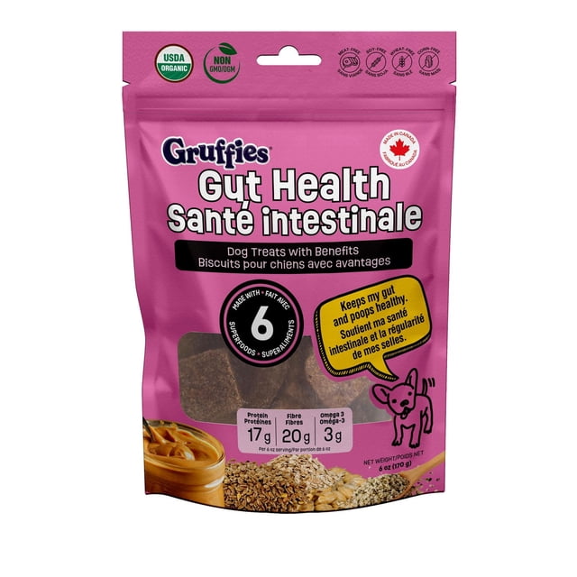 Gruffies Gut Health Dog Treats in a pink resealable pouch made in Canada, USDA organic and non-GMO. These soft & chewy dog treats support digestive health with 6 superfoods, providing 17g protein, 20g fiber, and 3g omega-3 per 6 oz serving. Free from meat, soy, wheat, and corn, featuring peanut butter flavor and a cartoon dog promoting gut and stool health benefits.