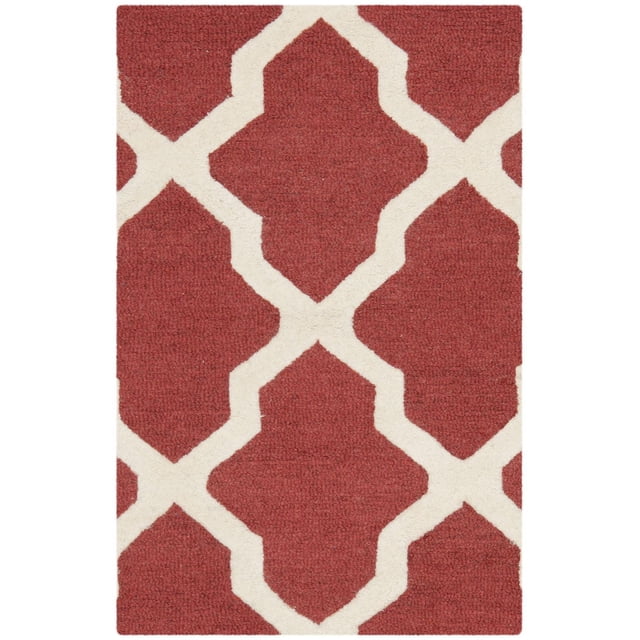 Safavieh Cambridge Liam Geometric Area Rug in deep red with off-white geometric trellis pattern, hand-tufted wool featuring plush cut pile and textured high/low loop pile, suitable for adding durable modern American style to home or office accent areas.