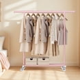 thumbnail image 4 of SONGMICS Clothes Rack with Wheels, Heavy-Duty Clothing Rack for Hanging Clothes, Portable Garment Rack, with Extendable Hanging Rail, 220 lb Load Capacity, Jelly Pink UHSR013R01, 4 of 8