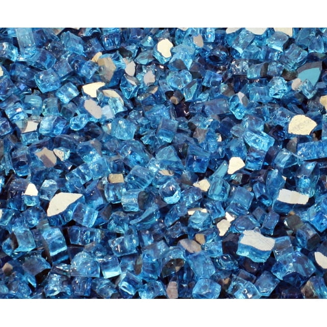 Paramount FireGlass, Luminous Black, 1/2IN, 40 lbs Carton showing a close-up of small, irregular blue reflective fire glass pieces with shiny surfaces and mirrored fragments, ideal for outdoor heating and fire pit glass decoration that retains heat without burning or melting.