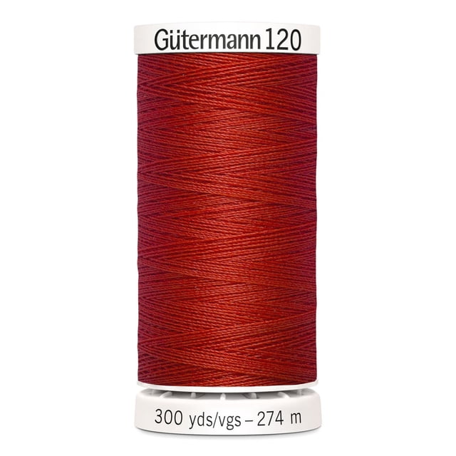 Gutermann 120 100% polyester all purpose sewing thread spool in deep red, tightly wound on white plastic bobbin labeled with brand and 300 yards (274 meters) length, suitable for machine and hand sewing various fabrics including cotton, synthetics, and craft projects like home décor and beading.