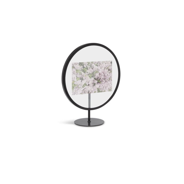 Infinity Photo Display 4X6 Black by Umbra, a floating circular picture frame with a black metal stand holding a 4x6 photo of lilac flowers between two glass panes, designed for tabletop or wall display in modern home décor.