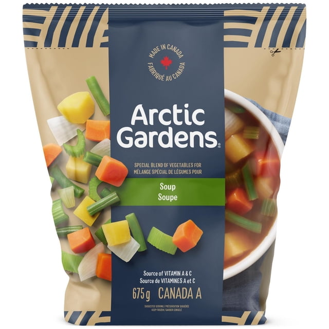 Arctic Gardens Soup Mix 675g package featuring a special blend of diced vegetables including carrots, green beans, celery, onions, and potatoes for soup, with a bowl of prepared vegetable soup visible on the right side, noted as a source of vitamins A and C and made in Canada.