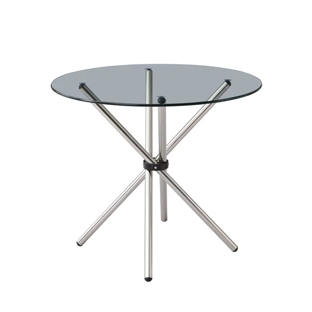 Velets Bella Glass Top Dining Table with stainless steel legs, featuring a round clear glass top and modern crossed-leg design. Its durable construction and sleek design make it ideal for dining rooms, kitchens, or living rooms, and its compact size suits breakfast nooks and small spaces.