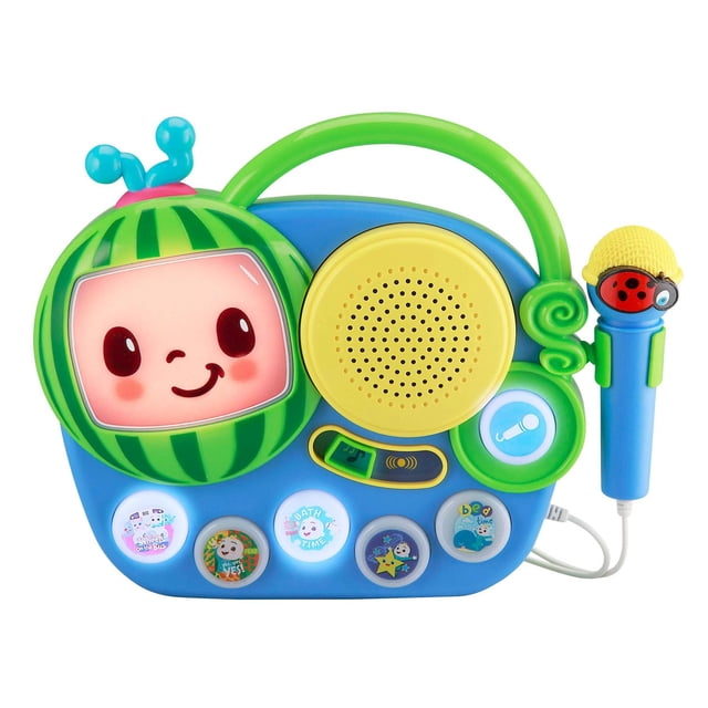 Cocomelon Sing-along Boombox with built in Music featuring a blue base, green handle, and yellow speaker. It has a green watermelon character face, five illuminated song buttons, and a blue microphone with a yellow mesh top and ladybug design, designed for kids aged 3 and up.