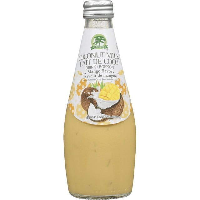 Evergreen Mango Coconut Milk, 9.81 fl. oz. glass bottle with silver screw cap, featuring a white label with green Evergreen logo and bilingual text describing a mango-flavored non-dairy coconut milk drink with nata de coco, illustrated with a halved coconut and diced mango on a yellow polka dot background, filled with creamy yellow liquid suitable for plant-based beverage consumers.