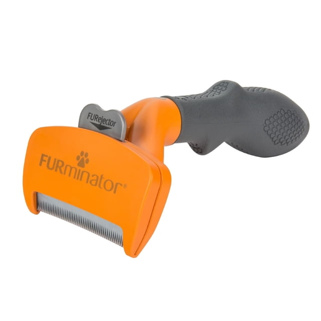 FURminator deShedding Tool for Medium Dogs with Long Hair with an orange curved edge blade featuring the FURminator logo, a gray FURejector button for quick hair release, and a black ergonomic rubber handle with textured grip, designed to remove loose undercoat hair and reduce shedding effectively.