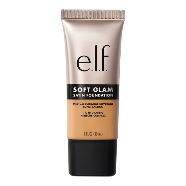 e.l.f. Cosmetics Soft Glam Satin Foundation in a 30 ml tube with beige liquid foundation, offering medium buildable coverage and a satin finish. Infused with 1% Hydrating Hibiscus Complex, it provides long-lasting hydration and smooth, breathable skin, suitable for dry, oily, and combination skin types.