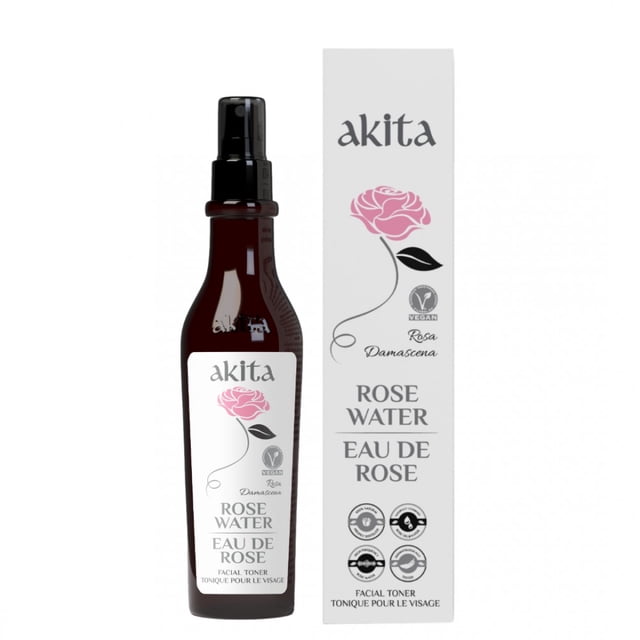 NATURAL NON DEOILED ROSE WATER 250ML by Akita, presented in a dark amber spray bottle with a pink rose illustration and vegan certification on the label. Accompanied by a matching box with similar branding, this organic skincare product serves as a natural face toner, ideal for hydration and facial cleansing.