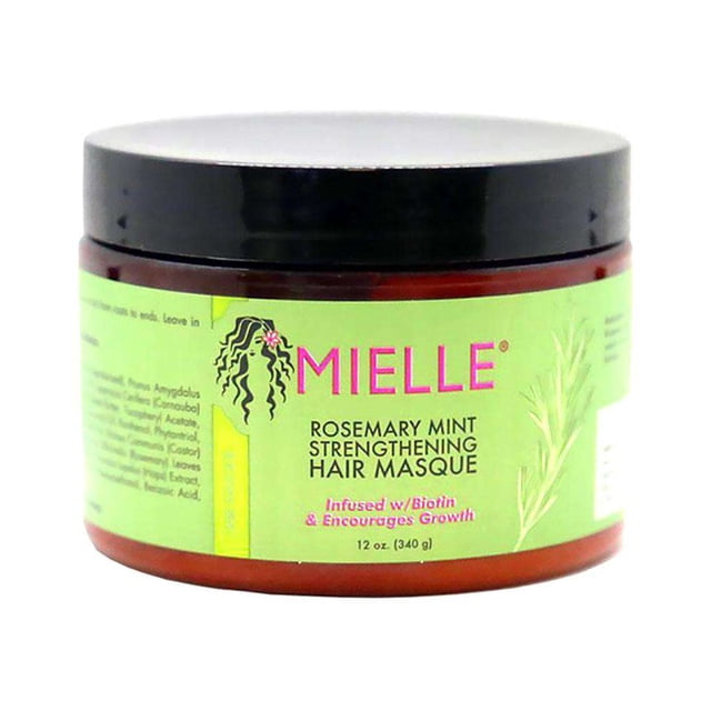 Mielle Organics Rosemary Mint Masque Capillaire Fortifiant, un Masque Capillaire de 12 oz (340 g) Conçu pour une Hydratation et une Nutrition en Profondeur. le Pot Présente une Étiquette Verte avec Image de Marque Rose et illustrations de Romarin, Mettant l'Accent sur Sa Formule Infusée de Biotine pour la Pousse des Cheveux et le Rétablissement de l'Hydratation.