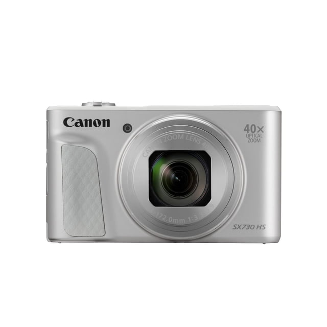Canon Powershot SX730 HS digital camera in silver with 40x optical zoom lens, front-facing view showing the Canon logo, textured grip, and compact point-and-shoot design suitable for travel photography.