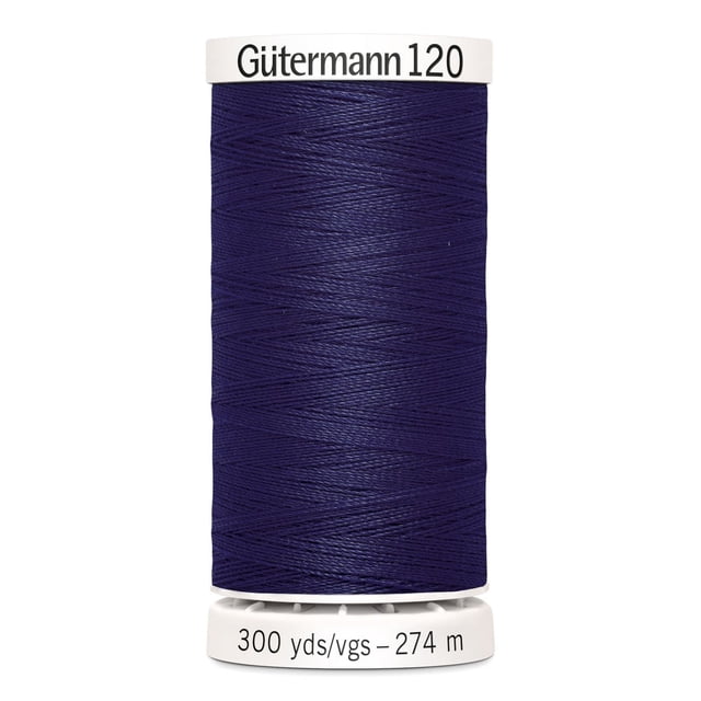Gutermann 120 100% polyester all purpose thread spool in dark navy blue with white plastic caps labeled with brand and 300 yards (274 meters) length, suitable for machine and hand sewing various fabrics including cotton, synthetics, and natural fibers, also ideal for craft and mending projects.