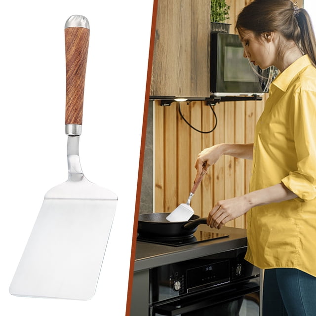 PRETXORVE A Stainless Steel and Wooden-handled Kitchen Spatula Is A Small Household Kitchen