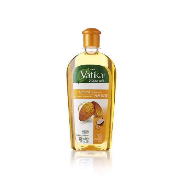 Dabur Vatika Almond Enriched Hair Oil in a clear 300 ml bottle with a golden flip-top cap, featuring a green and white label with almond and coconut illustrations, enriched with almond, coconut, and sesame oils to moisturize and add softness and shine to hair.
