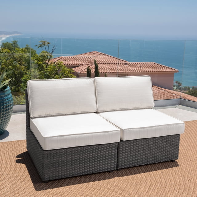 Outdoor Patio Furniture, 2 Piece-PE Wicker Rattan Armless Sofa Sectional Conversation Sofa Set in gray, featuring two armless chairs with a hand-woven PE rattan wicker frame and plush, water-resistant beige cushions. The set is displayed on a patio with a coastal view, showcasing its versatile placement for gardens, porches, or balconies. Each chair measures 26.25 inches in length, 30 inches in width, and 26 inches in height, with a weight of 21.94 lbs.