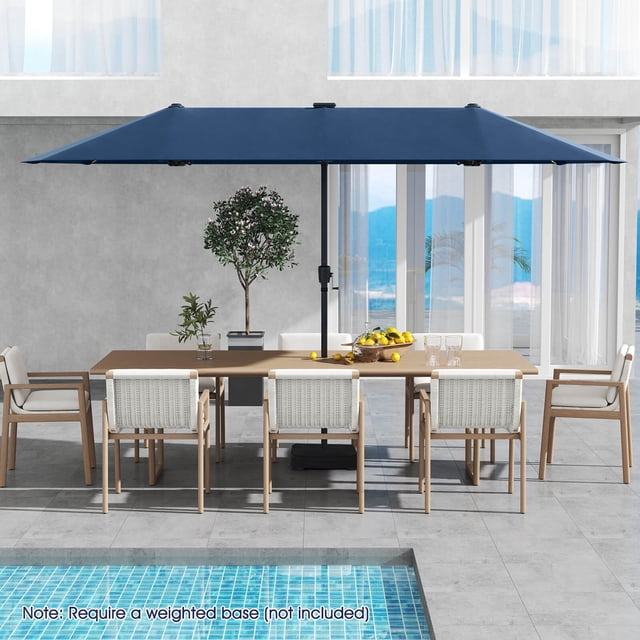 Costway 13 FT Large Patio Umbrella with LED Solar Lights Crank Handle 12 Heavy-Duty Ribs in navy, displayed in a contemporary outdoor dining area. The umbrella offers 13 x 7 ft of shade, perfect for backyard gatherings or poolside relaxation. It includes a fade-resistant polyester canopy, 12 sturdy metal ribs, and 108 solar-powered LED lights for a warm evening glow. The crank handle ensures effortless operation, and the umbrella can be disassembled for compact storage. Weighted base not included.