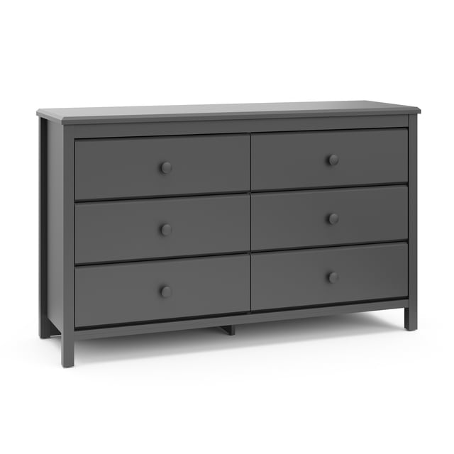Storkcraft Alpine 6-Drawer Double Dresser in grey with six spacious drawers and round knobs, crafted from wood composites with a durable laminate finish, featuring a safety interlocking drawer system and anti-tip kit, ideal for kids' rooms, shown front-facing on a white background.
