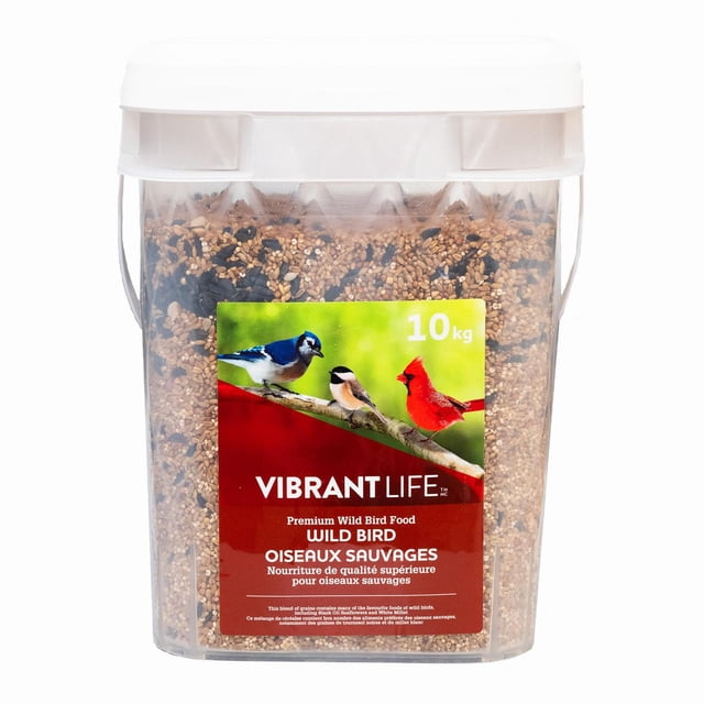 Vibrant Life Wild Bird Food Pail 10kg with a clear plastic container filled with a blend of grains including black oil sunflowers and white millet, featuring a label with images of a blue jay, chickadee, and cardinal on a branch against a green background, ideal for feeding wild birds in outdoor garden settings.