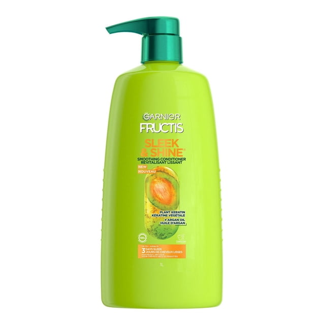 Garnier Fructis Sleek & Shine Conditioner in a lime green 1L bottle with teal pump dispenser, enriched with argan oil and plant keratin to smooth frizzy, dry hair and provide long-lasting frizz control up to 3 days, ideal for daily hair care.