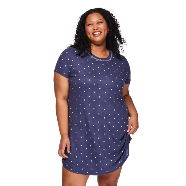 George Women's Plus Printed Sleepshirt front-facing centered view of a relaxed knee-length plus-size sleepshirt with short sleeves, crew neck and curved hem, shown in an all-over print on whisper luxe knit (95% polyester, 5% spandex) highlighting soft, breathable drape suitable for lounging.