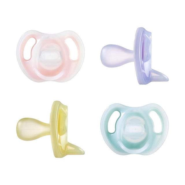 Tommee Tippee Ultra-Light Silicone Pacifier, Symmetrical One-Piece Design, BPA-Free Silicone Binkies, 6-18m, 4 Count featuring four pastel-colored pacifiers in pink, purple, yellow, and blue with curved shields and symmetrical silicone nipples designed to soothe babies and stay comfortably in their mouths during feeding and calming.