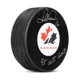 thumbnail image 1 of Darcy Tucker Team Canada Signed Hockey Canada Logo Puck, 1 of 2