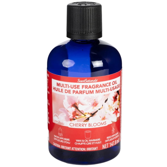 ScentSationals Multi Use Fragrance Oil Cherry Blooms in a blue glass bottle with black ribbed cap and red label featuring cherry blossom flowers, suitable for water diffusers, wax and oil warmers, and reed diffusers, containing 147.8 ml, ideal as an air freshener refill for home or office.