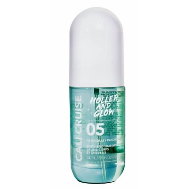 Holler And Glow Brume pour le Corps et les Cheveux au Patchouli Cali Cruise dans une Bouteille Vaporisateur Transparente Turquoise avec un Bouchon Arrondi Blanc, avec Texte Blanc et un tube de Pulvérisation visible à l'Intérieur, Conçue pour Rafraîchir la Peau et les Cheveux avec un Parfum de Patchouli Longue Durée.