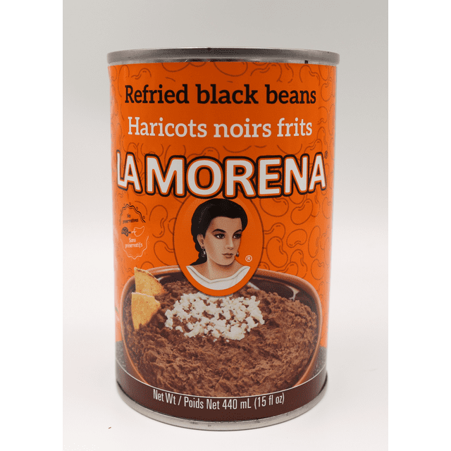 Refried black beans can with bright orange label featuring the LA MORENA brand name, bilingual English and French text, and an image of refried black beans topped with white cheese and two tortilla chips, net weight 440 mL (15 fl oz).
