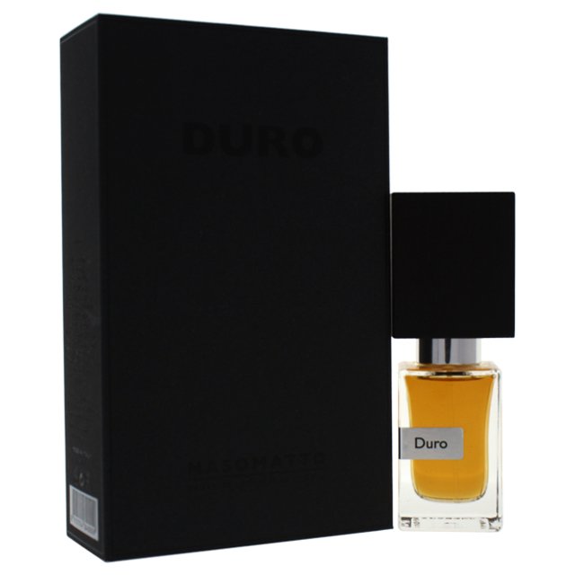 Duro by Nasomatto for Unisex - 1 oz EDP Spray. A 1 oz bottle of extrait de parfum featuring a sleek rectangular glass design with amber-colored liquid and a bold black cap. The fragrance box, in matte black with the word 'Duro' embossed, is positioned beside the bottle. This oriental and woody fragrance, launched in 2008, includes notes of leather, woodsy elements, and spices, making it suitable for various occasions.