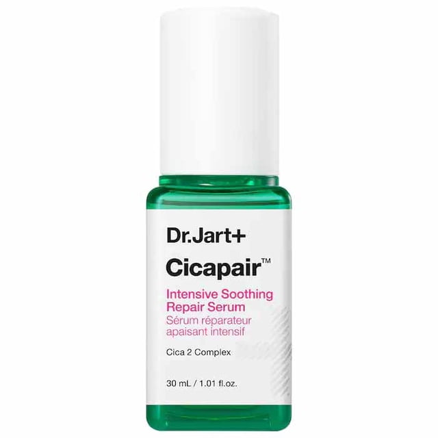 Dr. Jart+ Cicapair Intensive Soothing Repair Serum in a 30 mL bottle with a green base and white cap. The label highlights its calming formula with Cica Complex, designed to reduce redness and hydrate sensitive skin. Suitable for all skin types.