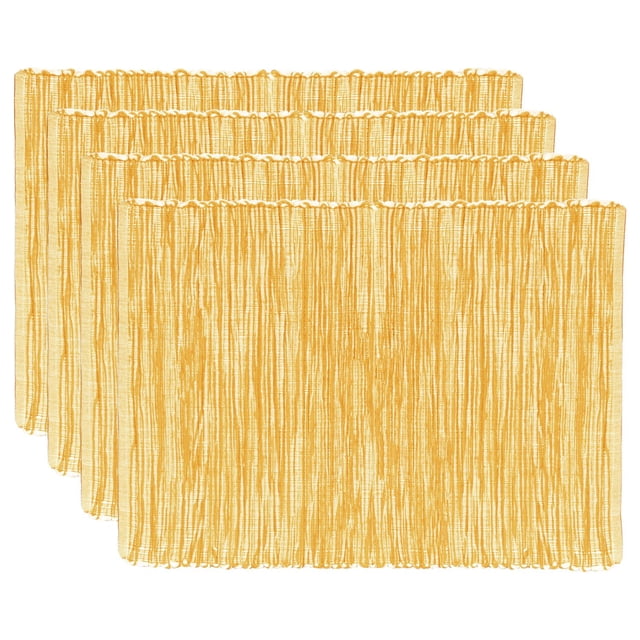 Fabstyles Shadows Cotton Placemats Set of 4 in mustard yellow, each 13 by 19 inches, featuring heavyweight woven cotton with a rustic texture, suitable for kitchen, dining, coffee, patio, or outdoor tables, arranged overlapping on a white background.